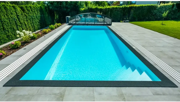 Qbig overflow poolpaket med svart ram och turkost vatten