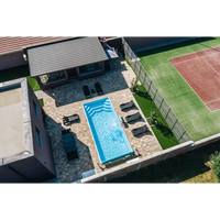 Rektangulär blå Aruba Plus trädgårdspool 8x3,7x1,5m med kakelkanter och vattenripplor