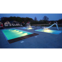 Bahama trädgårdspool med upplyst pool och pooltak, turkost vatten