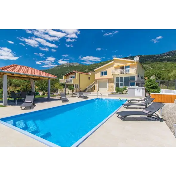 Glasfiberpool Jamaika 11,25m x 3,75m x 1,50m med blå pool och lounge