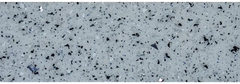 Grå fläckig bänkskiva med svarta och silverfärgade fläckar vid rektangulär glasfiberpool Saba