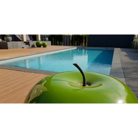 Grön äppelformad trädgårdsdekoration i Natura Kiruna paket