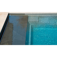 Modern Leisurepools Cube pool med turkost vatten och svart kant