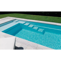 Modern Leisurepools Elite pool med turkost vatten och grå stenplattor