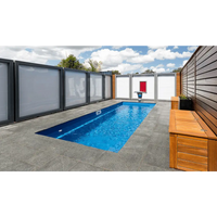 Leisurepools Espirit rektangulär pool 2,25×5,7m med blåvatten och stenplattor