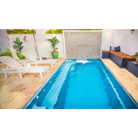 Elegant Leisurepools Harmony pool med blåvatten och vattenfall, 2,9×5-8m