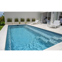 Leisurepools Harmony rektangulär pool med turkost vatten och vita kakelkanter