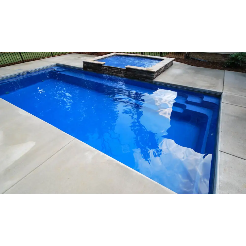 Leisurepools Reflection rektangulär pool med blå simkanal och stensteg till hot tub