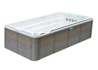 Modern PassionSpa Activity 2 Deep Swim Spa med vit insida, grå träpaneler, tan ränder och blå LED-ljus