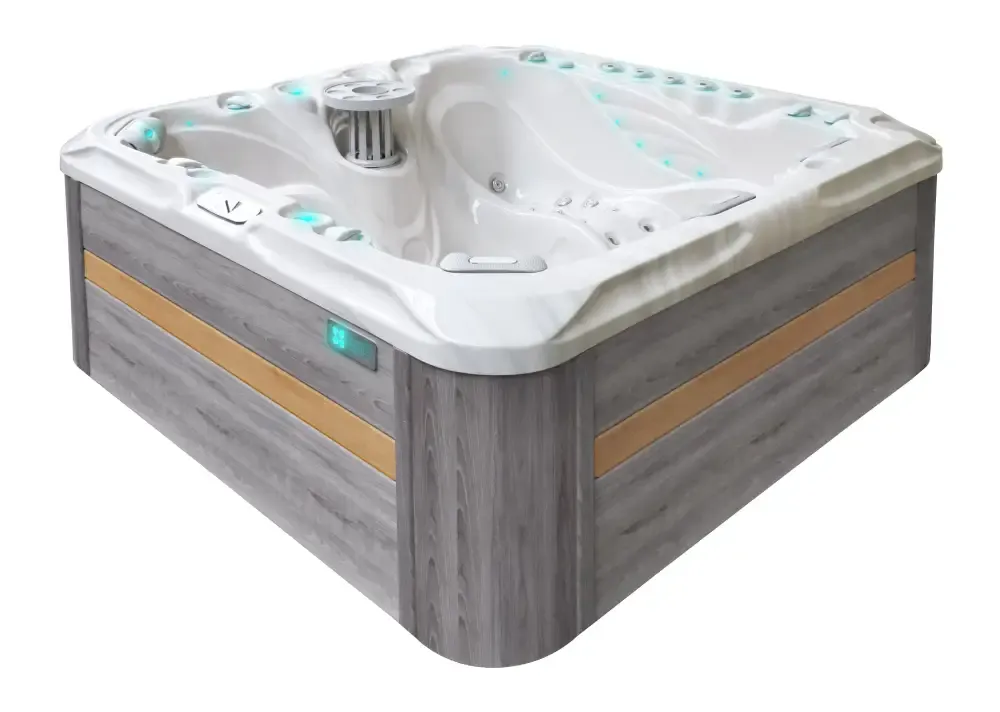 Modern vitvar PassionSpa Felicity Mighty Wave Spabad med grå träsidopaneler och amberaccent