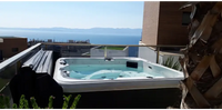 Vit PassionSpa Relax Spabad Pure Collection, vit rektangulär med blåvatten och svarta paneler