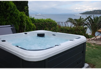 Svartvit PassionSpa Relax Spabad Pure Collection med bubblande vatten