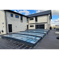 Pooltak ICON 4.5×9 sarg klarplast antracit med grå ramar över däck