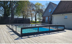 Pooltak Icon Kit med svart ram glashägnad och blå poolvatten