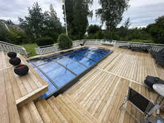 Elegant funktionellt pooltak Sydney över modern pool med glasöverdrag