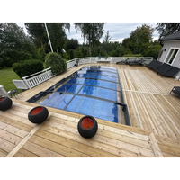 Transparent Pooltak Sydney 3.5×4.2 med blå texturerad yta och antracit ram