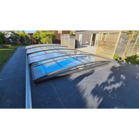 Modern Pooltak Sydney 4,5×8 med kurvig glas och antracit ram