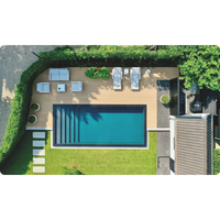 Självbärande PP pool 3.5x7m med klarblått vatten och svart kant i trädeck