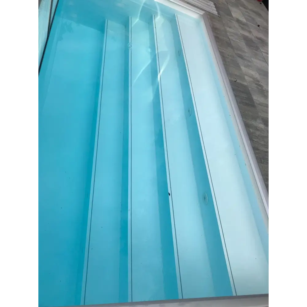 Pooltime Exklusiv 12mm PP pool 4x12x1,5 m med klarblått vatten och banlinjer