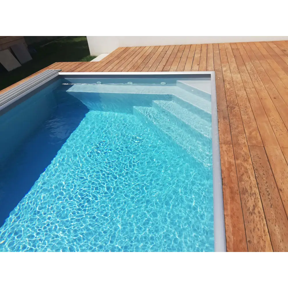 Pooltime Exklusiv 12mm PP pool 4x12x1,5 m med klarblått vatten och trädäcksbord