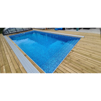 Thermopool Premium med blå mosaik, trädeck och silverkant