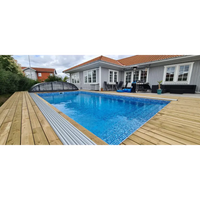 Thermopool Standard med blå mosaik och silverkant på trädeck