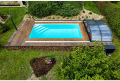 Rektangulär pool med klart blått vatten i Thermopp Poolpaket Qbig