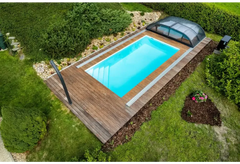 Rektangulär Thermopp poolpaket Qbig med klart blått vatten och trädeck