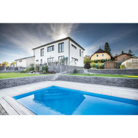 Modern vit tvåvåningshus med mörkgrå sten och stora fönster, ThermoPP Poolpaket QBig