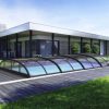 Trädgård, kompletterad med den innovativa Pooltak Smart 4x8 i en elegant antracitfinish.